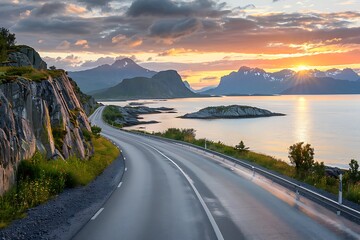 A beautiful road along the sea in Norway, with an ocean view and mountains on both sides. The sun sets behind them, casting warm hues across the sky - Powered by Adobe