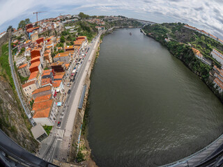 Medieval walls and cableway of Porto old town street view building, portugal view from luis bridge