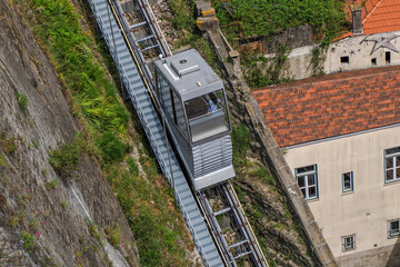 Medieval walls and cableway of Porto old town street view building, portugal view from luis bridge
