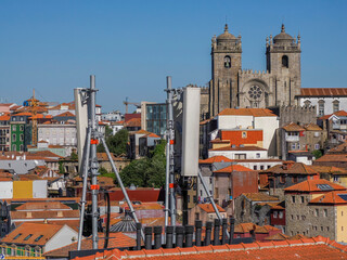 many communication antennae in Porto old town street view building, portugal