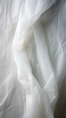 Obraz premium White crumpled fabric with dark shadows