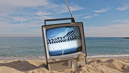 television with glitch next to the sea - 801285485
