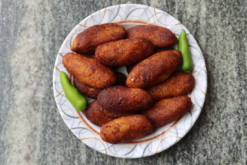 Spindle-Shaped Sweet on a plate From kerala 