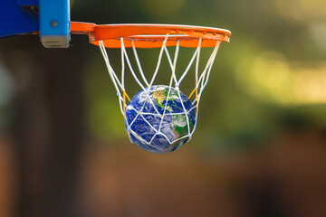 basketball in the shape of a planet in a hoop and net