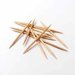 Group of double-tip wooden sticks on white background