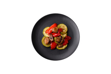Delicious fresh grilled vegetables zucchini, bell peppers, mushrooms and onions