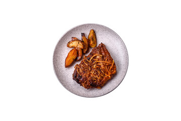 Delicious pork or beef ribs baked on the grill with salt, spices and herbs