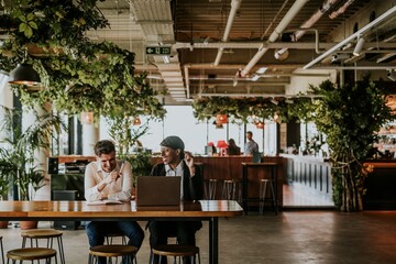 Business colleagues working together, co-working space photo