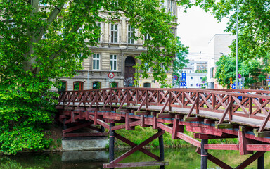 Kładka Świętej Antoniego: An old wooden bridge in Wrocław, Poland. It crosses the moat which...