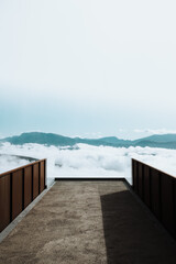 wooden pier over mountainscape