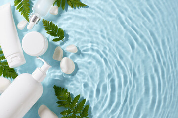 Skincare essentials elegantly placed on a rippling water surface, symbolizing tranquility and...