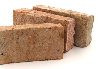 Solid clay bricks used for construction,Old red brick isolated on white background.