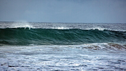 Waves breaking off the beach in Zipolite, Mexico