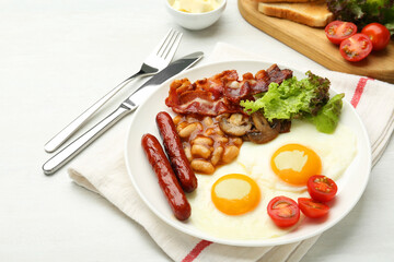 Delicious breakfast with sunny side up eggs served on white table, closeup