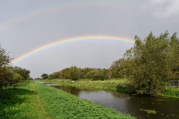 A double rainbow over one of the many waterways on a nature reserve on the Somerset levels