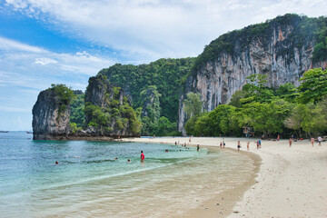 The beautiful of Hong island in Thailand with lush green hills and golden beaches surrounded by...