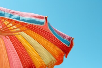 Colorful striped umbrella colorful background.