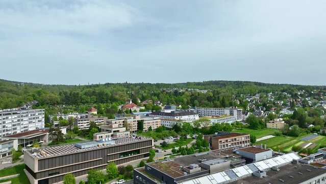 Aerial view of Swiss City of Z&uuml;rich with hospital and university buildings at Weinegg District on a cloudy spring afternoon. Movie shot April 30th, 2024, Zurich, Switzerland.