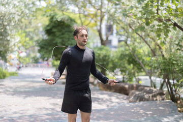 Male with skipping rope exercise