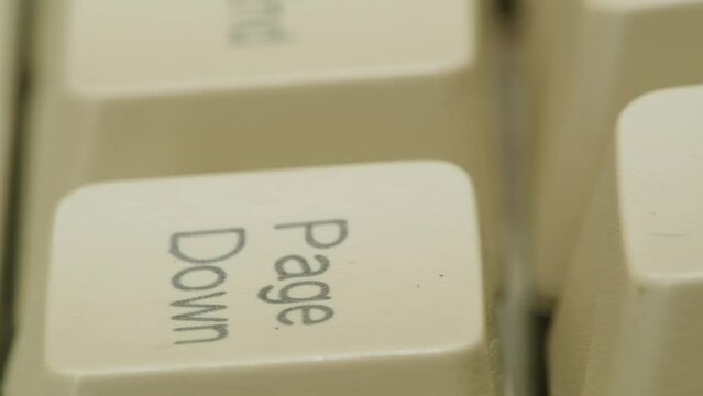 Old vintage keyboard retro pc close-up , Old computer studio close-up, Desktop vintage retro wave display, late 90s PC.
