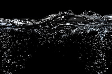 Water Surface with Ripple and Bubbles Float Up on Black Background.