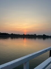 Fototapeta premium sunset over the river