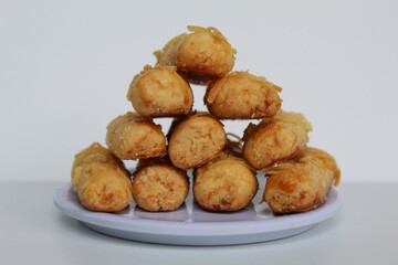 Kaasstengels or Kastengel, is Dutch influenced Indonesian cheese cookies in the form of sticks. Isolated in white background