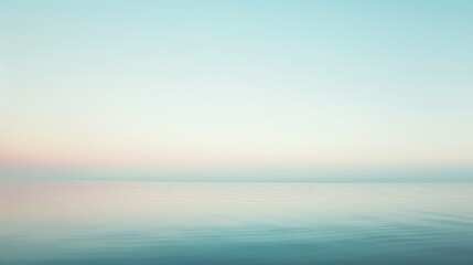 Fototapeta premium The serene waters of the ocean at dawn, bathed in pastel hues, evoke a sense of peace and tranquility, perfect for soothing and reflective content.