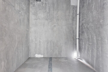 interior of the apartment without decoration in gray colors. rough finish