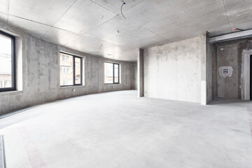 interior of the apartment without decoration in gray colors. rough finish