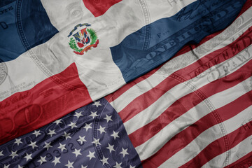 Obraz premium waving colorful flag of united states of america and national flag of dominican republic.