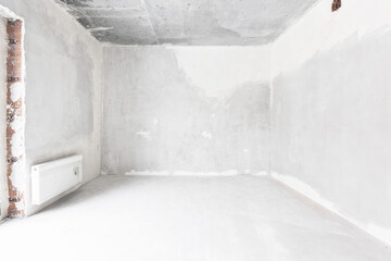 interior of the apartment without decoration in gray colors. rough finish