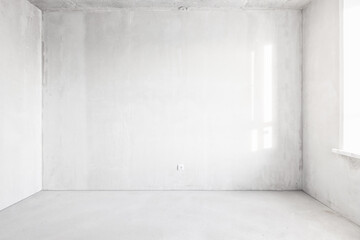 interior of the apartment without decoration in gray colors. rough finish