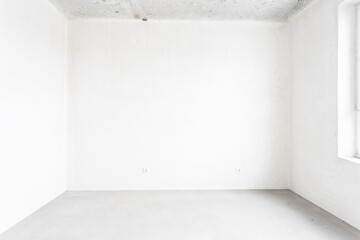 interior of the apartment without decoration in gray colors. rough finish