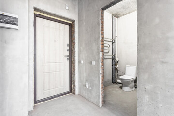 interior of the apartment without decoration in gray colors. rough finish