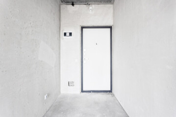 interior of the apartment without decoration in gray colors. rough finish