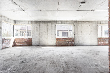 interior of the apartment without decoration in gray colors. rough finish