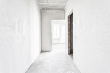interior of the apartment without decoration in gray colors. rough finish