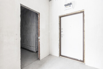 interior of the apartment without decoration in gray colors. rough finish