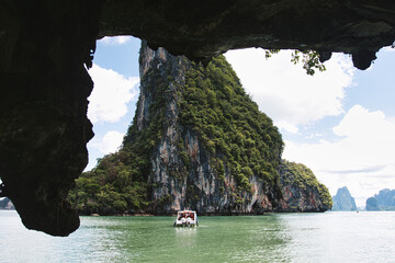PANYEE ISLAND, THAILAND August 23, 2023, natural cave at Panak island, Phang Nga Bay, Thailand. This was on a hot sunny afternoon during the wet season.