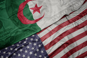 waving colorful flag of united states of america and national flag of algeria on the dollar money...