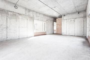 interior of the apartment without decoration in gray colors. rough finish