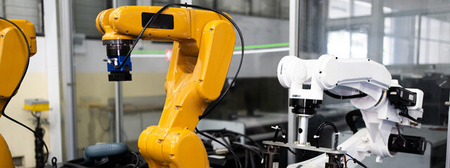 Automated Manufacturing Facility, Industrial robot works automatically in smart autonomous factory....