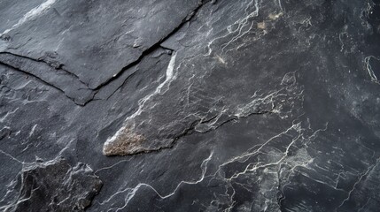 a dark grey slate slab, from above