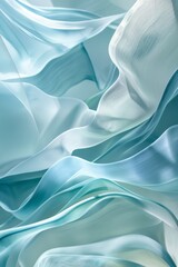 Fototapeta premium Translucent, flowing layers in various shades of blue and teal, resembling fluid fabrics or smoke-like waves. The composition exudes a calming and serene effect, with smooth curves and seamless 