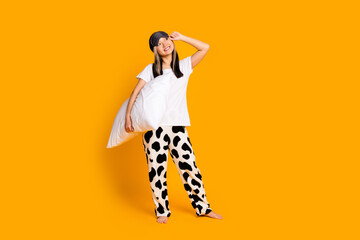 Full length photo of charming cute funny woman wear white trendy pajama look empty space isolated...