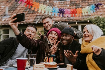 Friends taking a  group selfie
