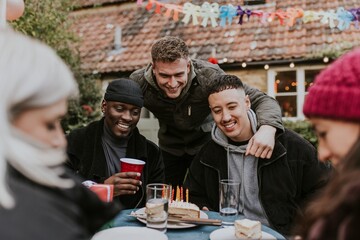 Friends gathering together at a birthday party