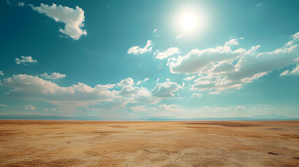 A wide, barren open space overlooking the sky and the hot sun during the day.