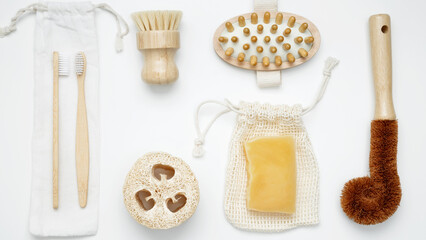 Natural organic eco cosmetics. Soap Eco, reusable cotton pads, loofah natural sponge washcloth, cotton swab, eucalyptus leaves on white background. Flat lay, top view